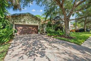 photo 1 of 974 Mill Creek Dr, Palm Beach Gardens, FL 33410