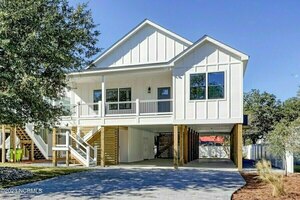 photo 1 of 119 NE 31st St, Oak Island, NC 28465