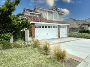 photo 1 of 19375 Woodlands Dr, Huntington Beach, CA 92648