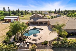 photo 1 of 21557 E Mondy Ln, Linden, CA 95236