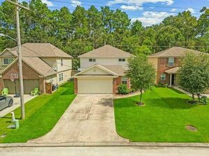 photo 1 of 9957 Kingfisher Dr, Conroe, TX 77385