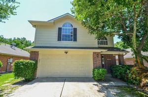 photo 1 of 21795 Whispering Forest Dr, Kingwood, TX 77339