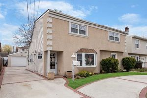 photo 1 of 1563 Meadowbrook Rd, North Merrick, NY 11566