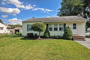 photo 1 of 122 Woodland Rd, Southborough, MA 01772