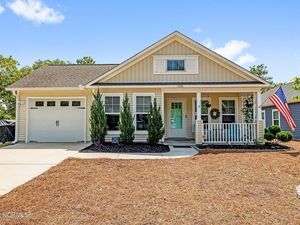 photo 1 of 126 NW 14th Street, Oak Island, NC 28465