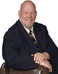 Russell G Hughes